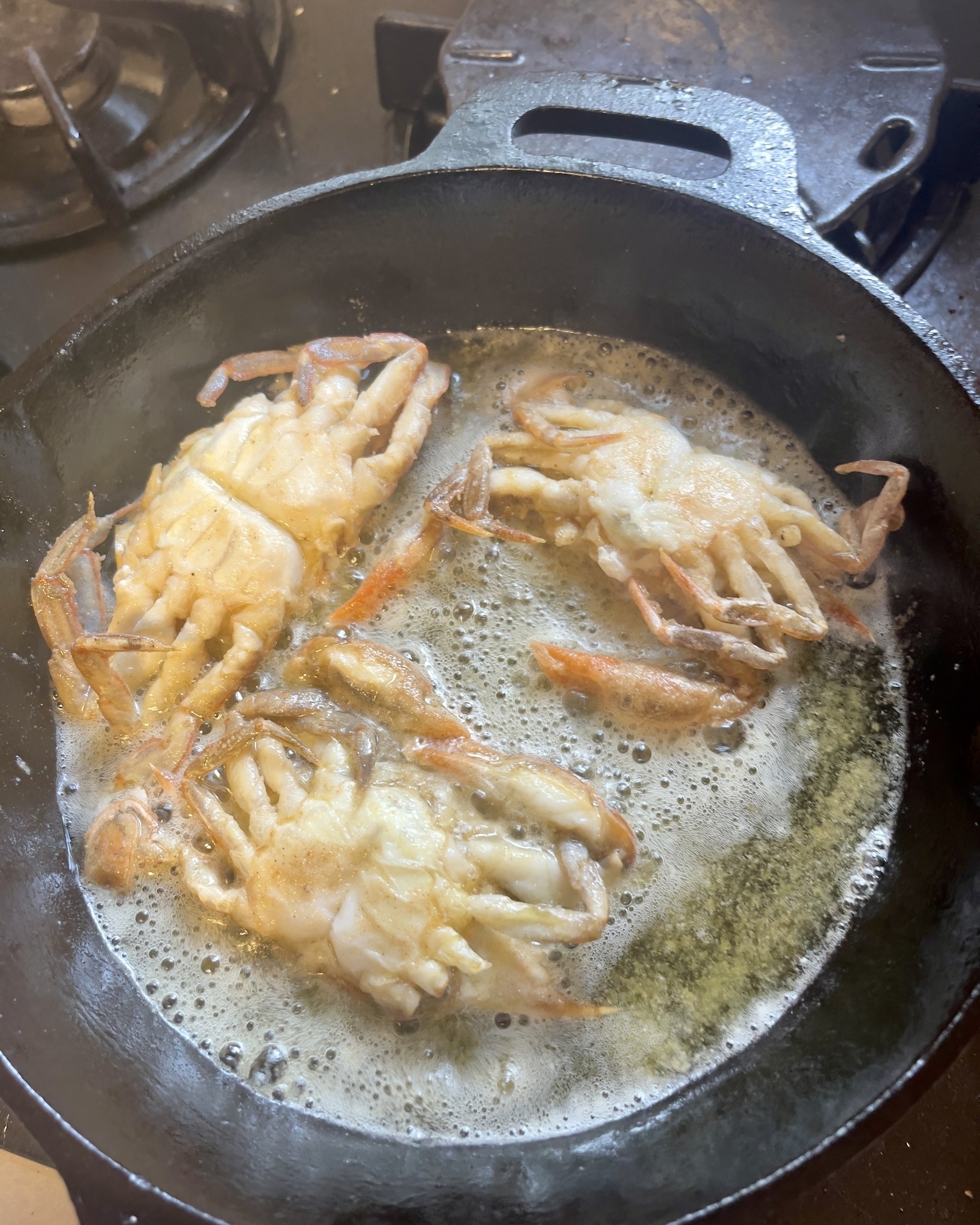 Soft shell crabs in the frying pan.