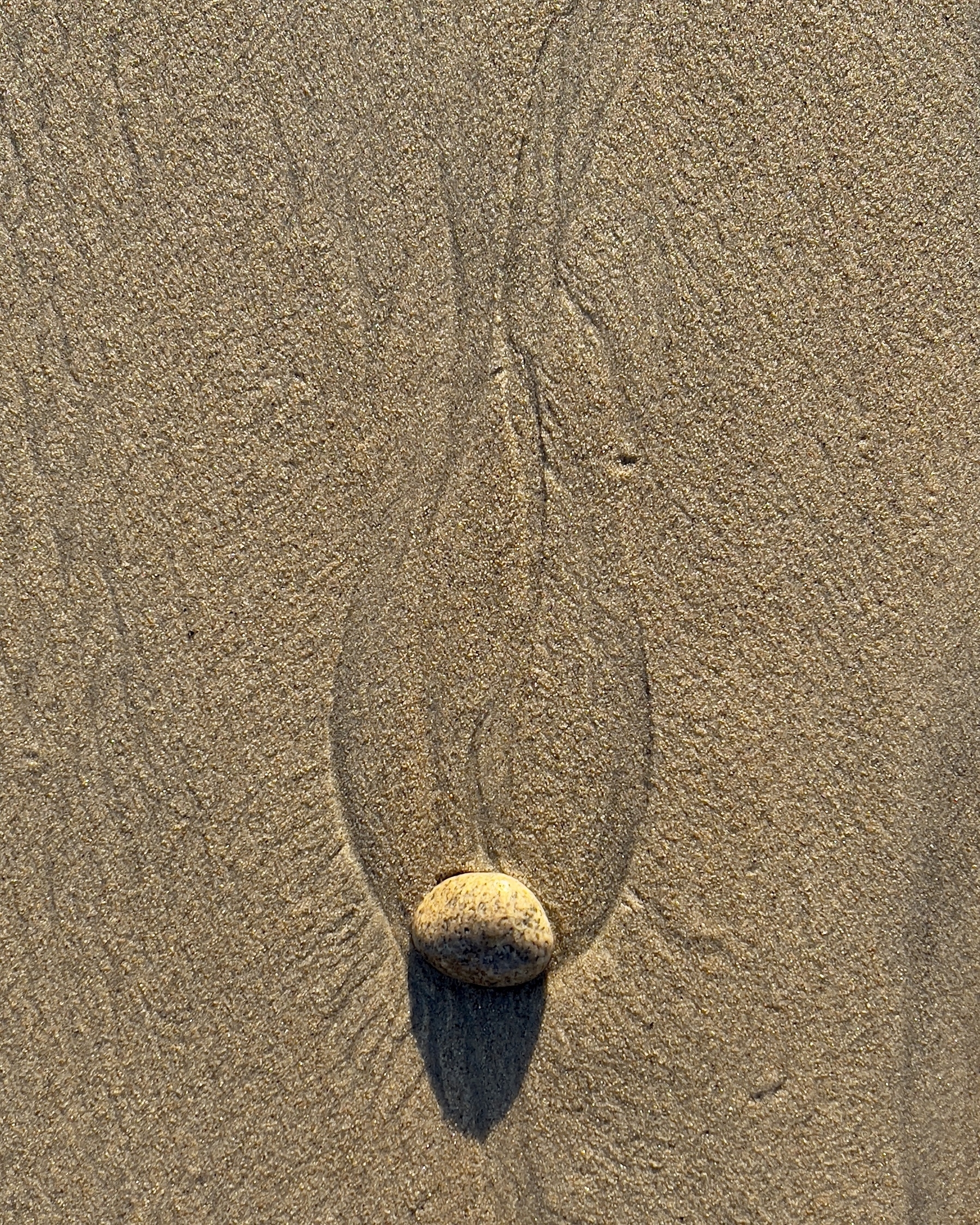 Stone, sand, erosion.