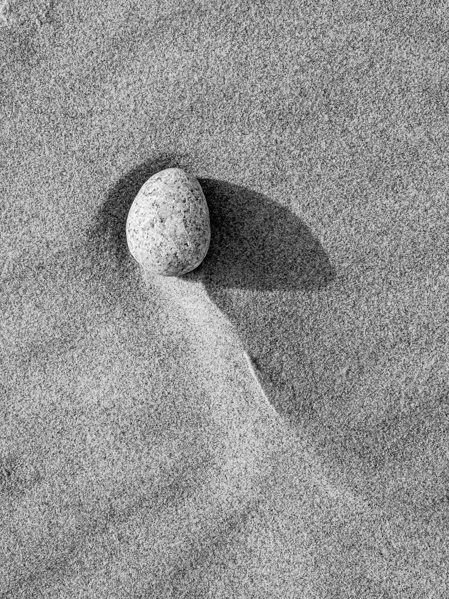 Stone and wind swept sand.