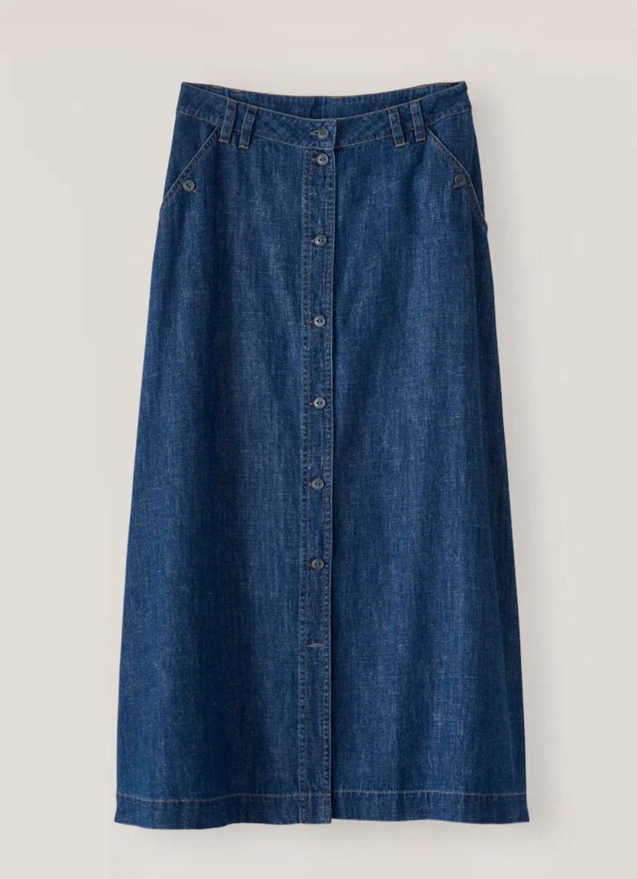 Denim A line skirt with button front closure.